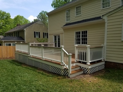 Trex composite deck, white rails, and white lattice