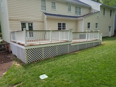 New deck with Trex composite decking and white railings